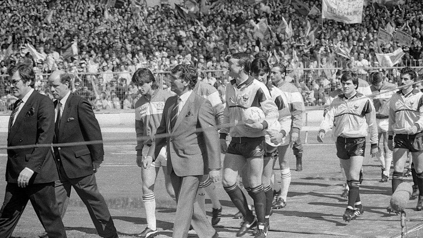 11 jim-smith-and-maurice-evans lead the teams out.jpg